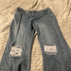 Brand new ripped jeans never worn, they were too big when I tried them on.